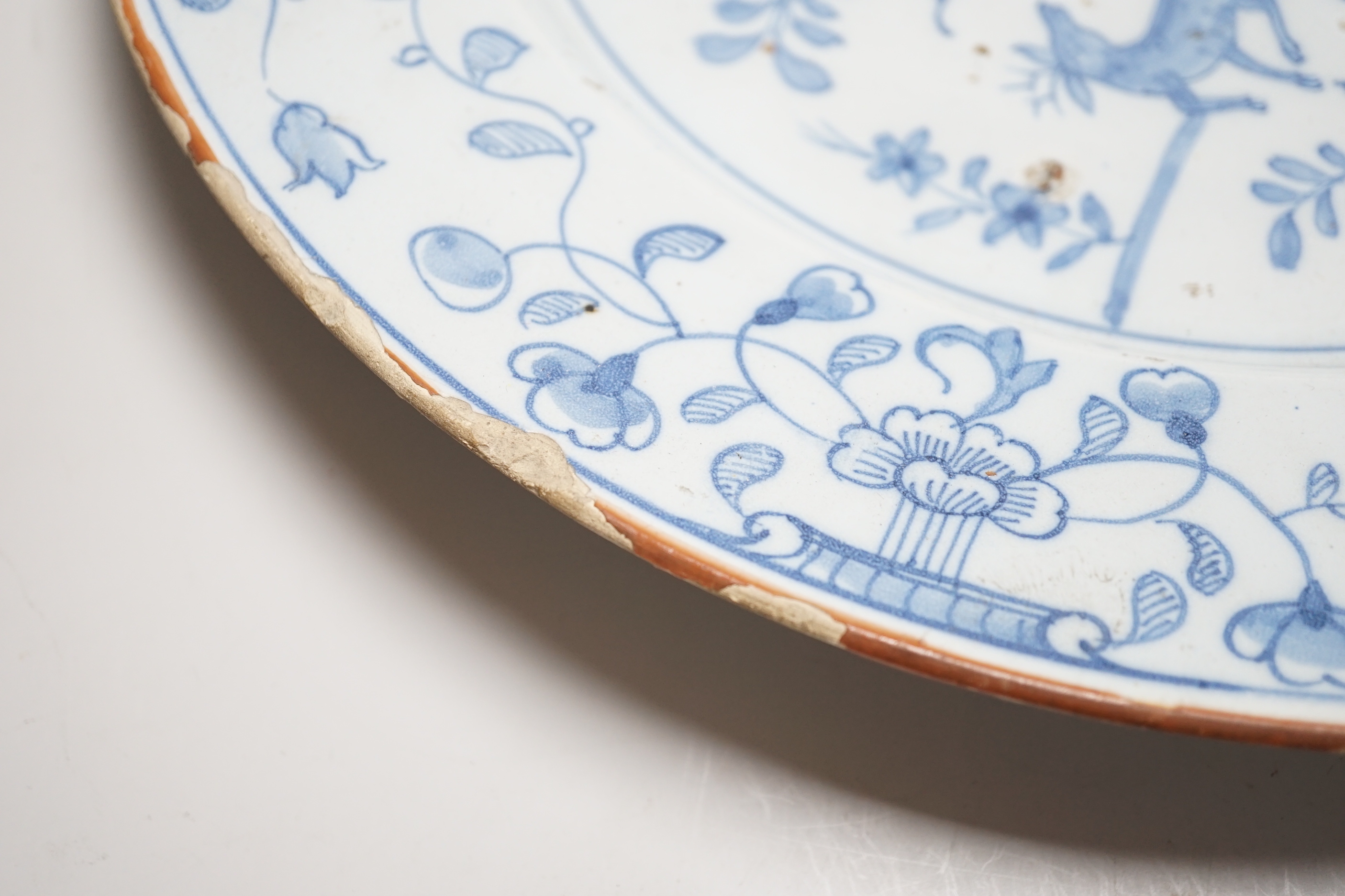 An 18th century Delft chinoiserie charger, 36cm diameter